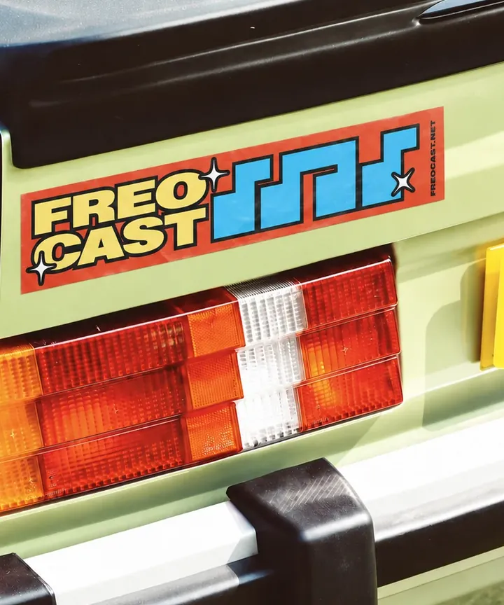 Colourful FREOCAST bumper sticker on a lime-green car