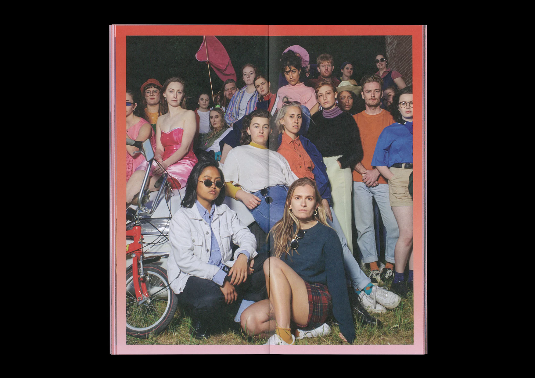 Summer Nights 2020 ensemble portrait bringing the season’s theatre-makers together in a pink-bordered programme spread